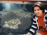 Наргиза и аквариум с водными черепахами